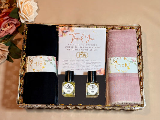 Handcrafted wedding gift with black and pink stoles and 15ml perfumes on crystal glass tray