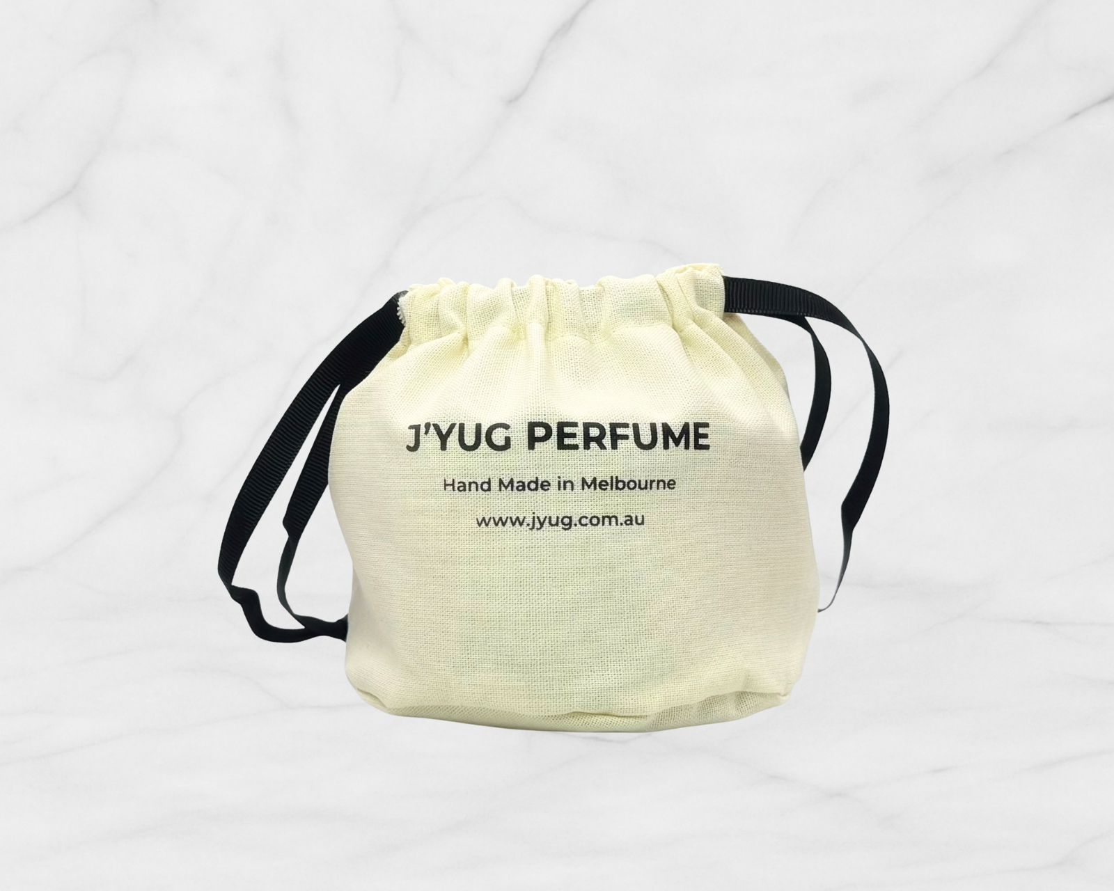 Wanderer candle lifestyle shot - vibrant citrus and floral scented candle by J'YUG